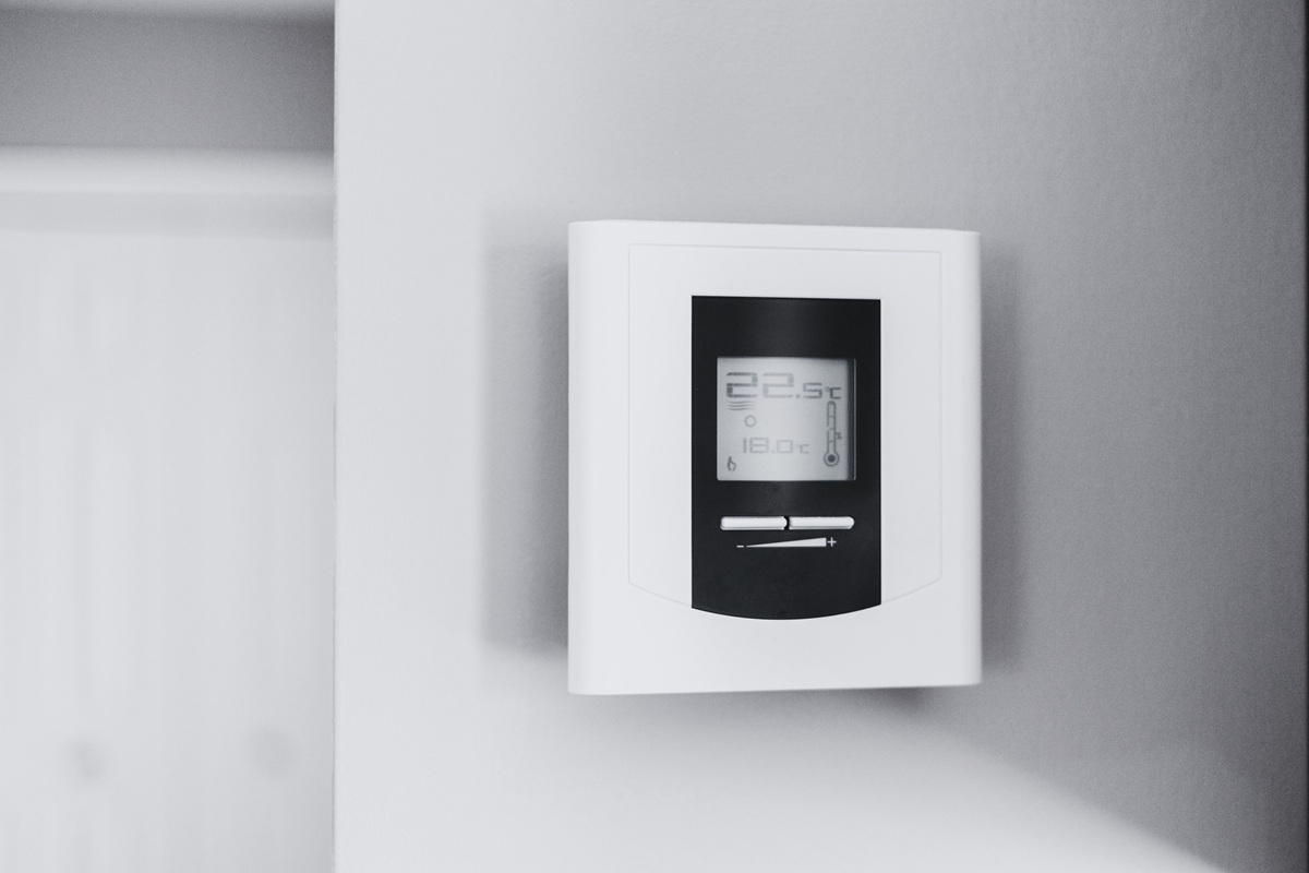 Thermostat control in hospitality environment illustrating operational design and guest sustainability behaviour