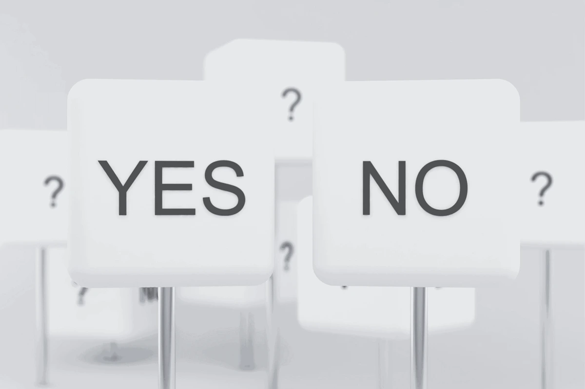 YES and NO signs surrounded by question marks, illustrating the assessment of hotel green claims